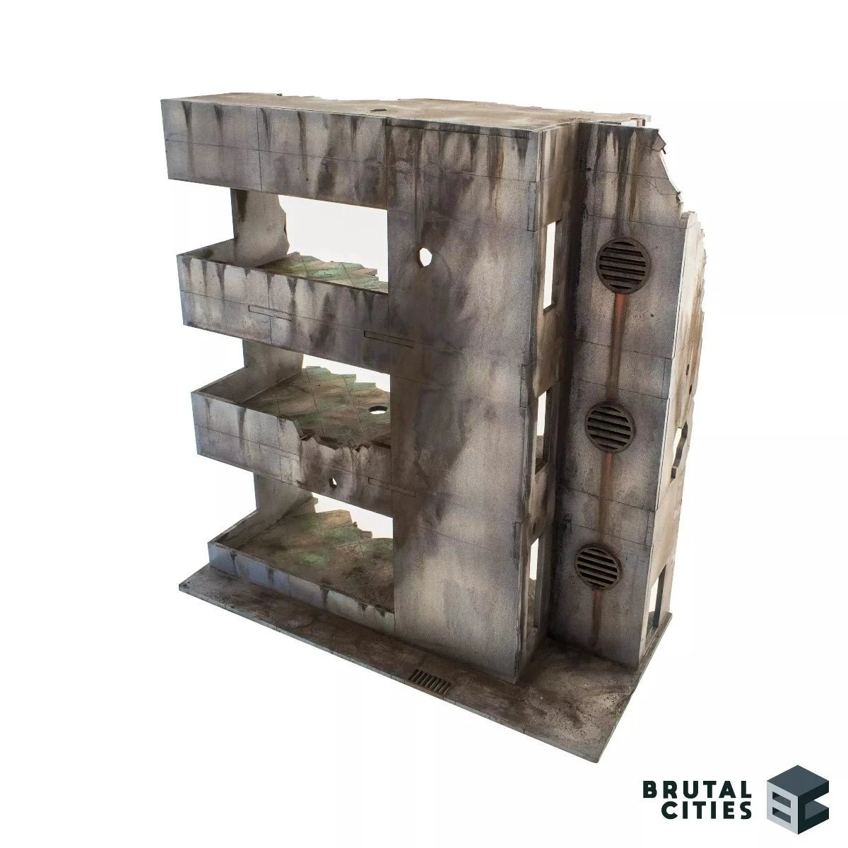 ruined urban wargaming terrain with missing pieces and collapsed walls