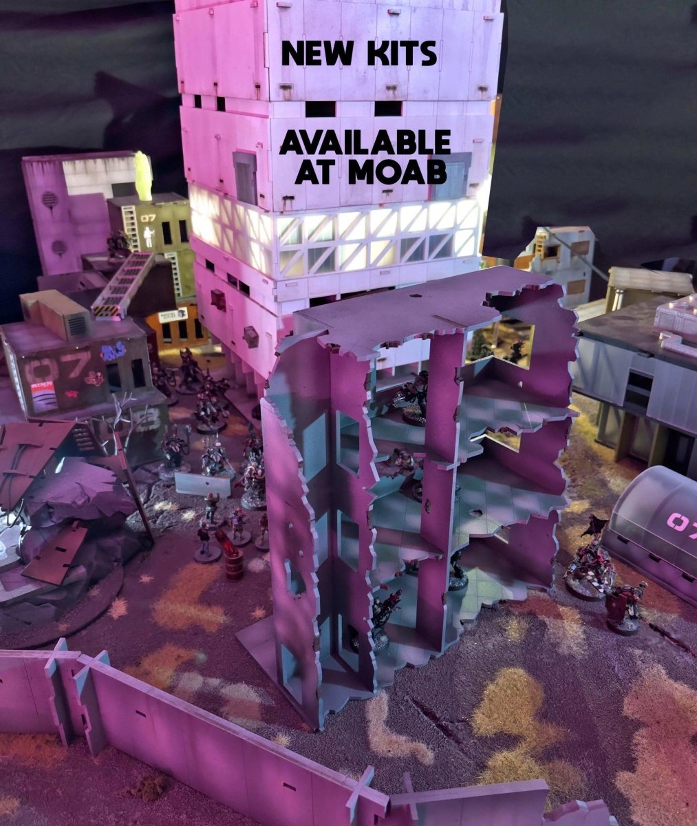 brutal cities kits available at moab. Large scifi building with smaller ruined mdf terrain in front