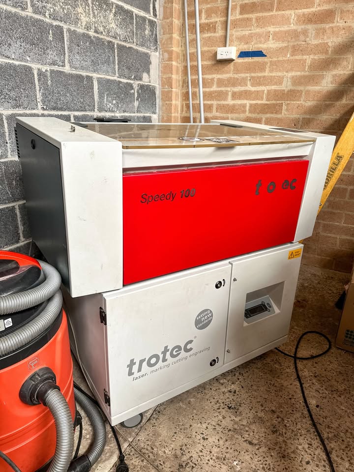 Red Trotec speedy 100 laser engraver and cutter