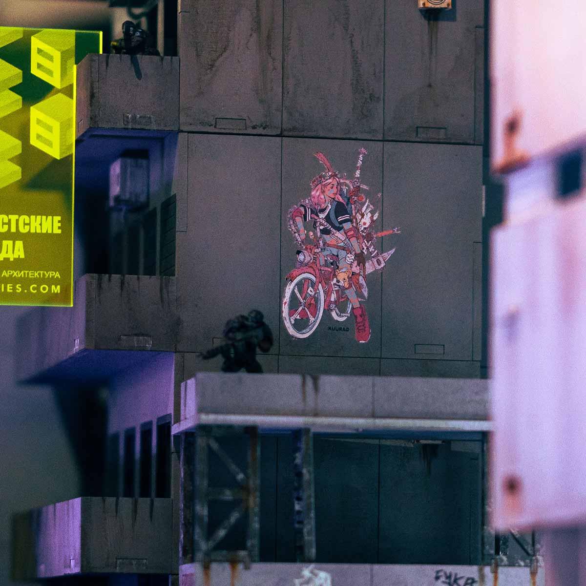 28mm terrain street scene showing cyberpunk mural graffiti